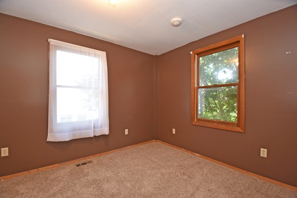 52 Central Street Gardner, MA 01440 - Photo 33 of 38 an empty room with a window