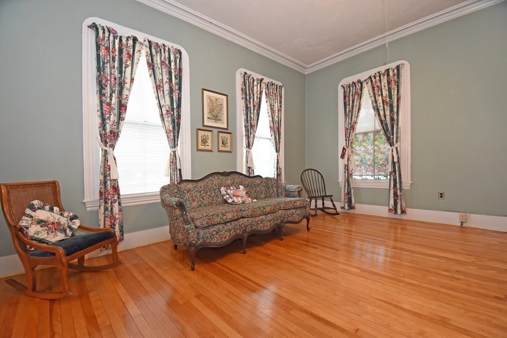 52 Central Street Gardner, MA 01440 - Photo 6 of 38 a living room with furniture and wooden floor