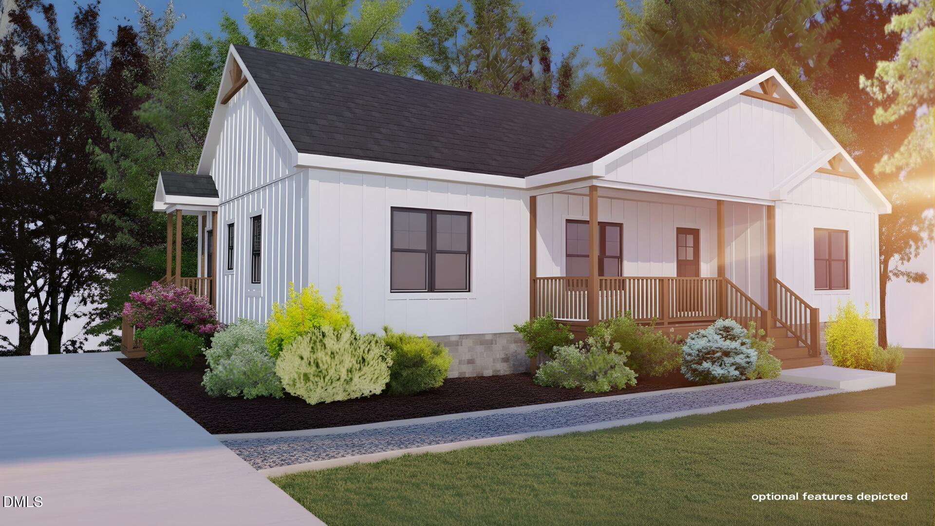 101 Stillwater Lane Roxboro, NC 27574 - Photo 34 of 38 a front view of a house with garden