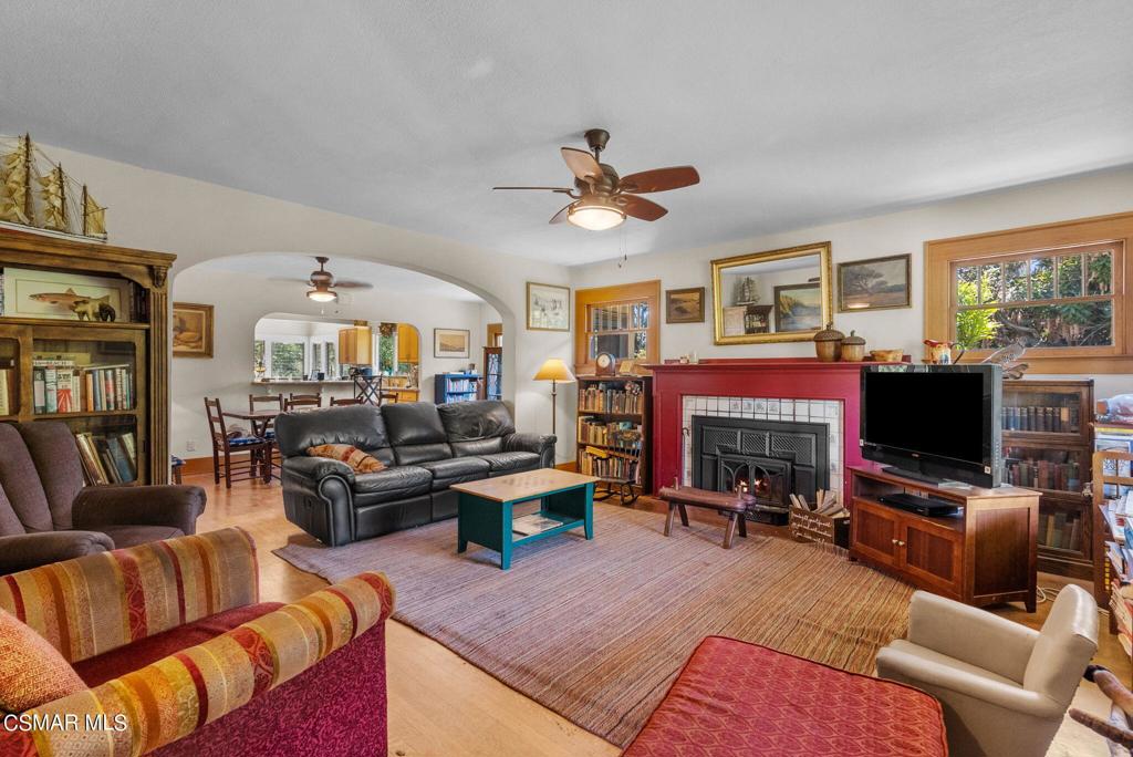 5682 Pine Grove Road Santa Paula, CA 93060 - Photo 18 of 53 a living room with furniture a fireplace and a flat screen tv