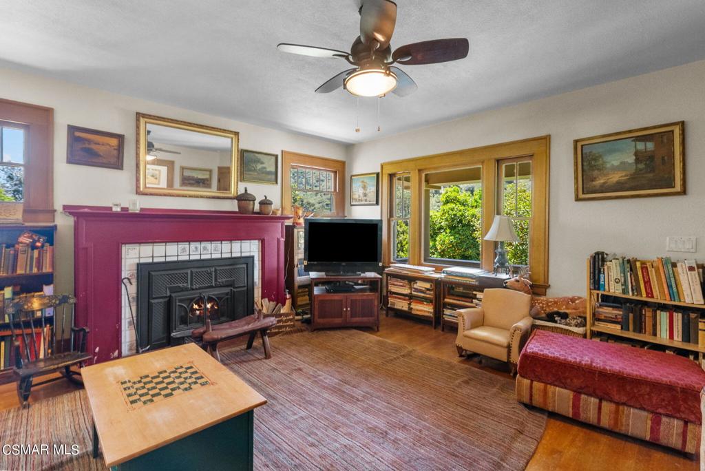5682 Pine Grove Road Santa Paula, CA 93060 - Photo 19 of 53 a living room with furniture and a fireplace