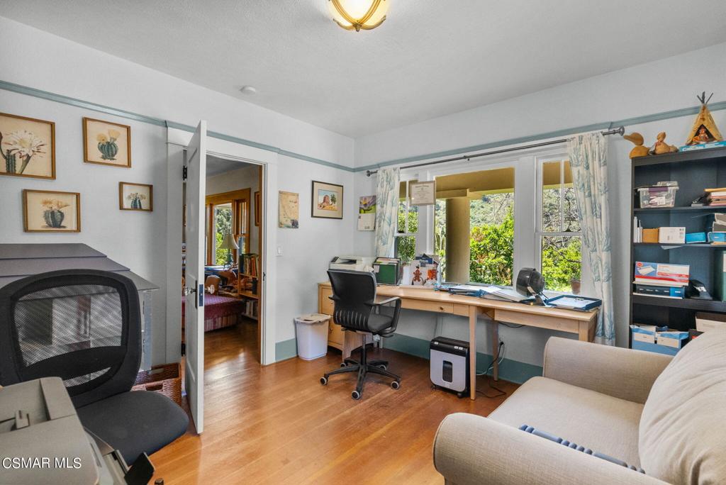 5682 Pine Grove Road Santa Paula, CA 93060 - Photo 26 of 53 a living room with furniture and a fireplace