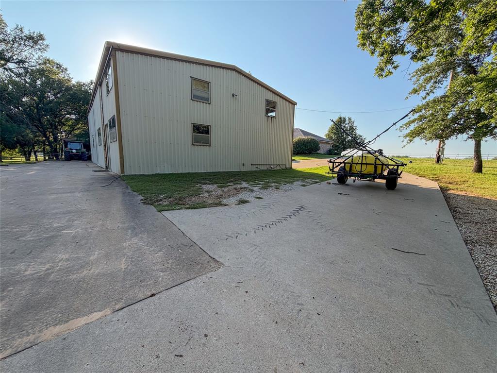 449 Private Road 4670 Rhome, TX 76078 - Photo 39 of 39 a view of a backyard of house