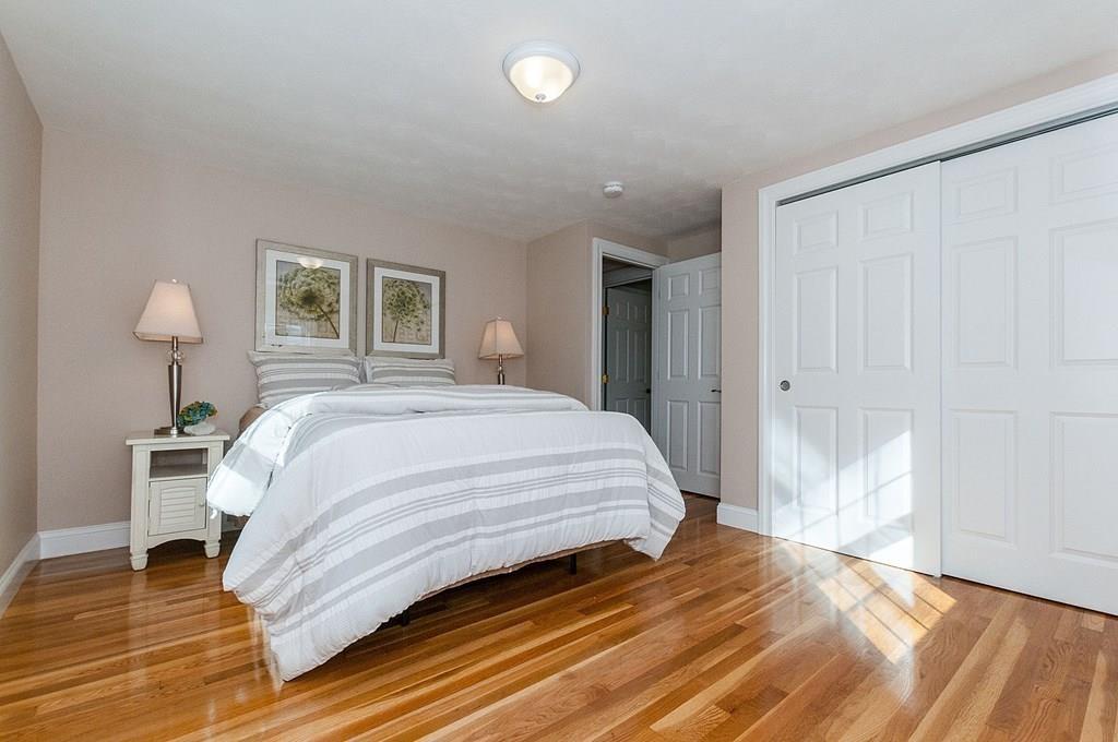22 Sharpe Road Belmont, MA 02478 - Photo 23 of 38 a bedroom with a bed and a window