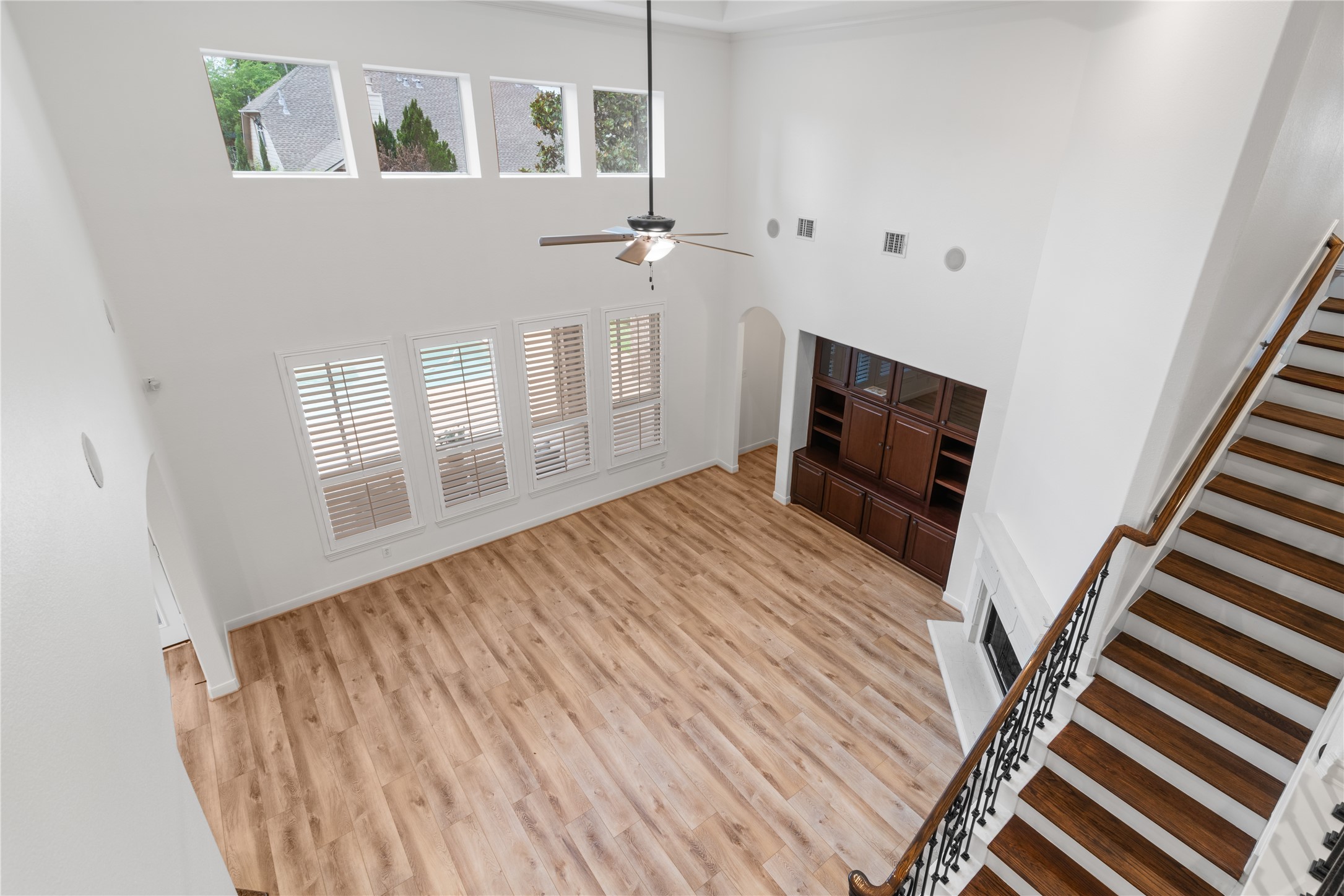 155 South Arrow Canyon Circle Spring, TX 77389 - Photo 24 of 49 The sophisticated wood flooring staircase serves as both a functional thoroughfare and a major architectural focal point.