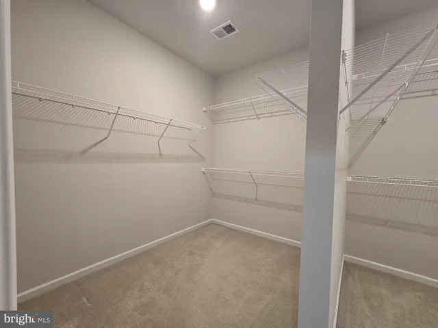 a view of a room with racks on the wall