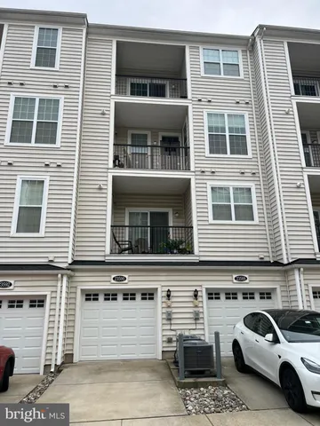 a view of a car parked in front of a building