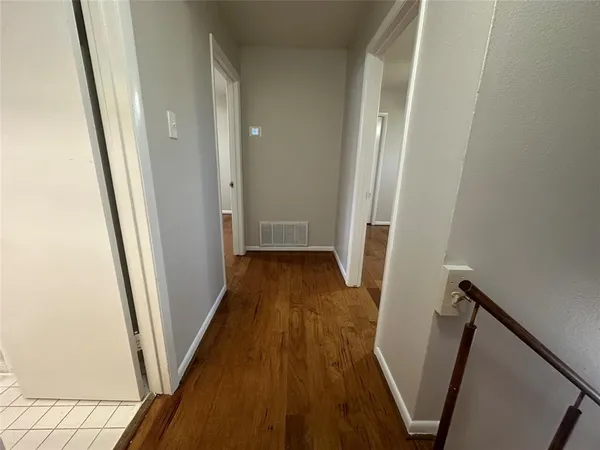 a bathroom with a bathtub and toilet