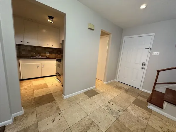 a bathroom with a sink and toilet
