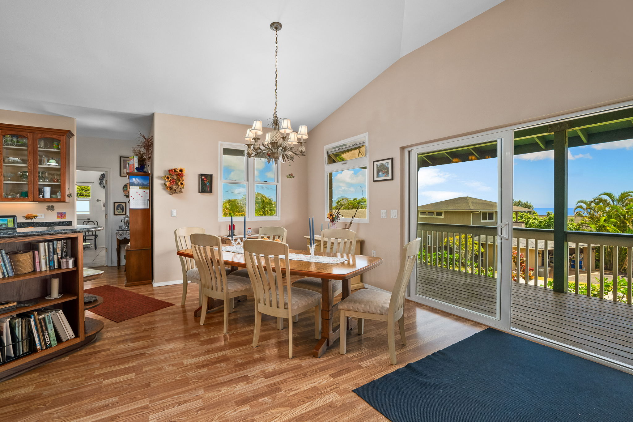 3837 Papalina Road Kalaheo, HI 96741 - Photo 13 of 26 a view of a dining room with furniture window and wooden floor