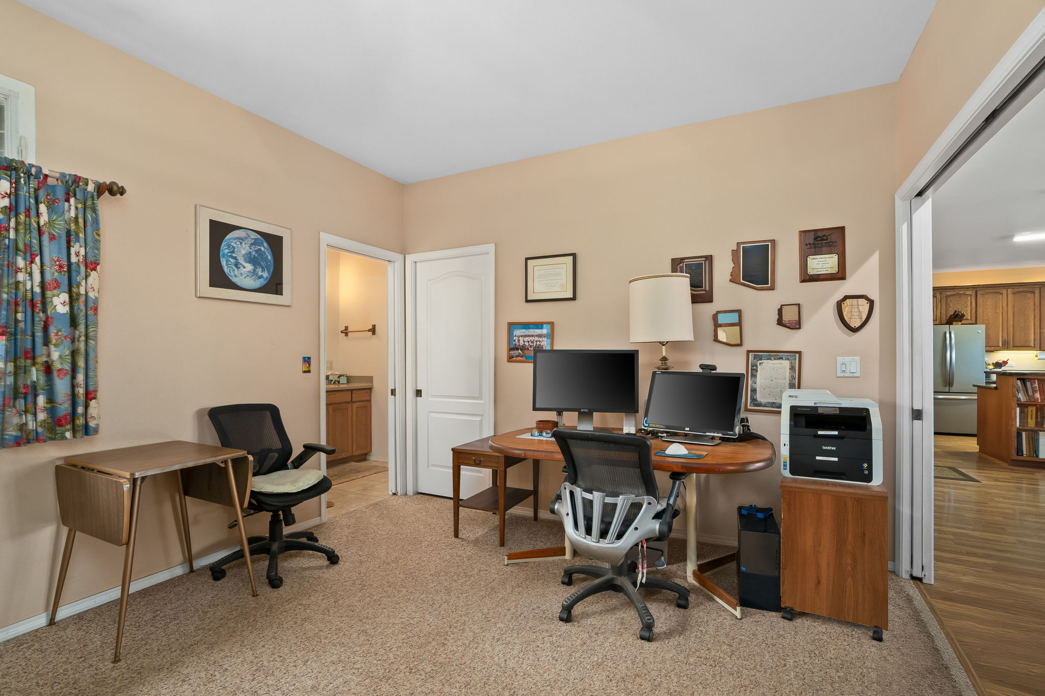 3837 Papalina Road Kalaheo, HI 96741 - Photo 21 of 26 a view of a workspace with furniture and a window