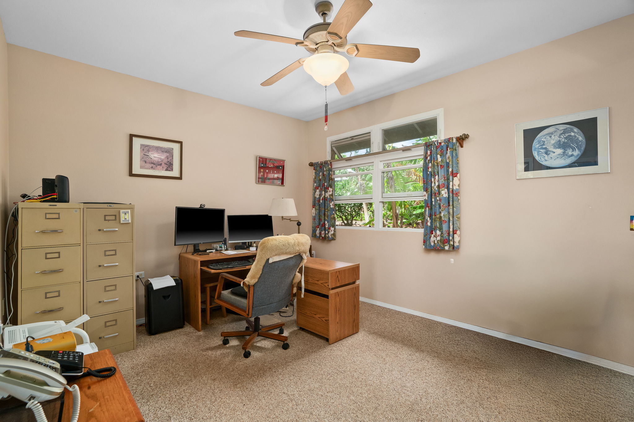 3837 Papalina Road Kalaheo, HI 96741 - Photo 22 of 26 a view of a workspace with furniture and a window