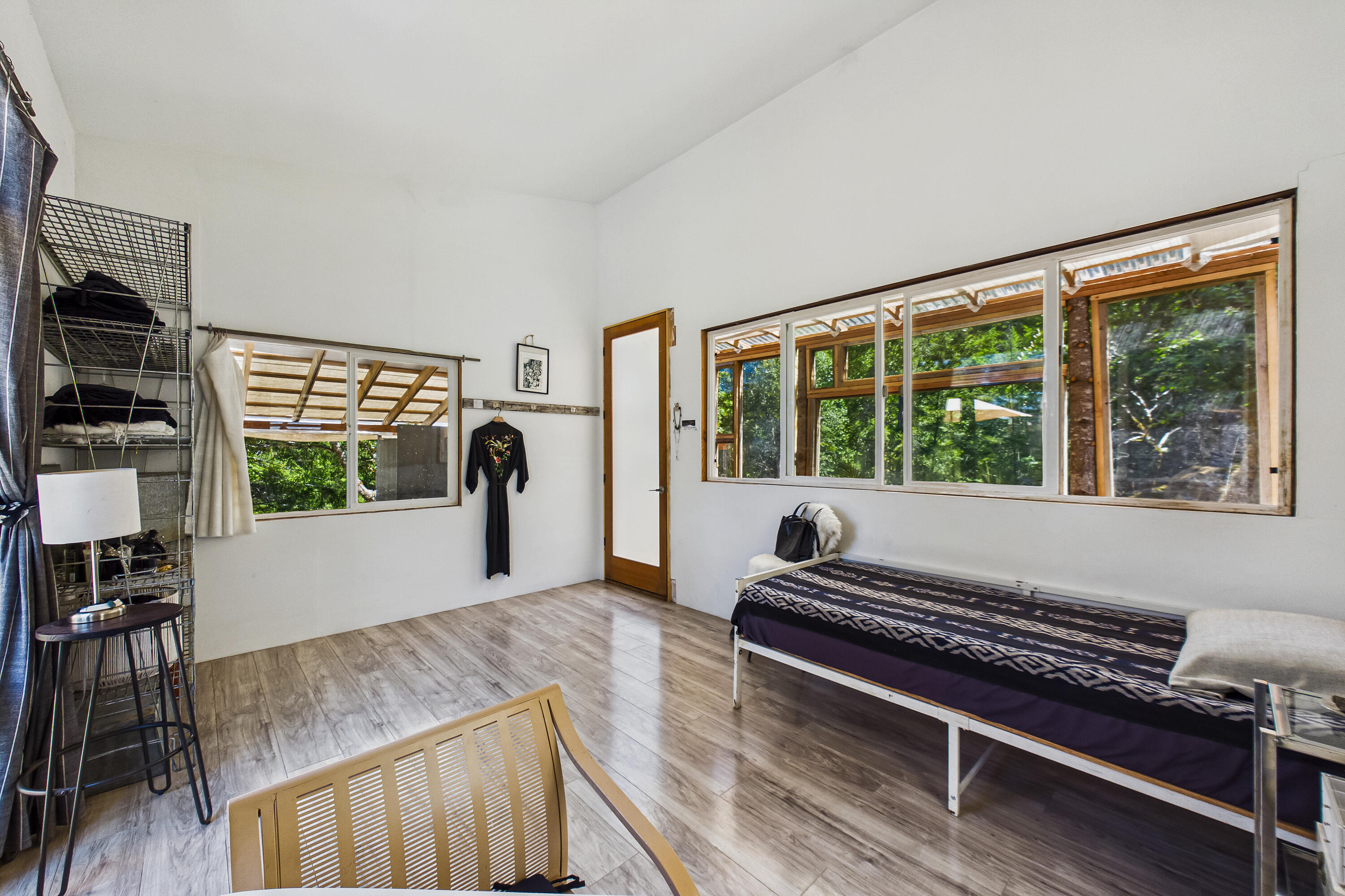 60890 Bell Springs Road Laytonville, CA 95454 - Photo 13 of 77 a living room with furniture a rug and a large window