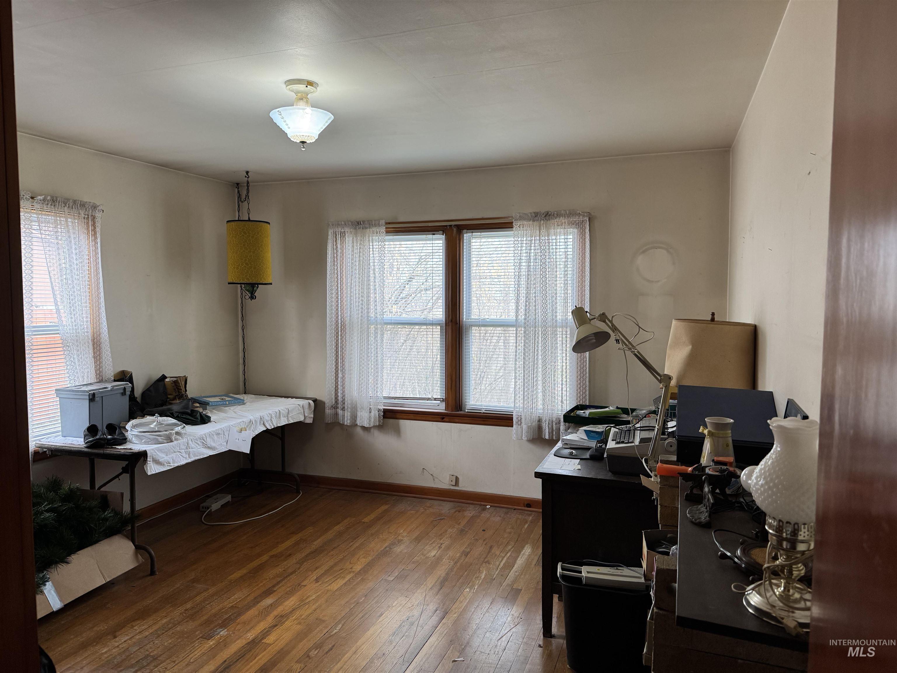 1109 3rd Street Kamiah, ID 83536 - Photo 12 of 17 Office space with dark wood finished floors and healthy amount of natural light