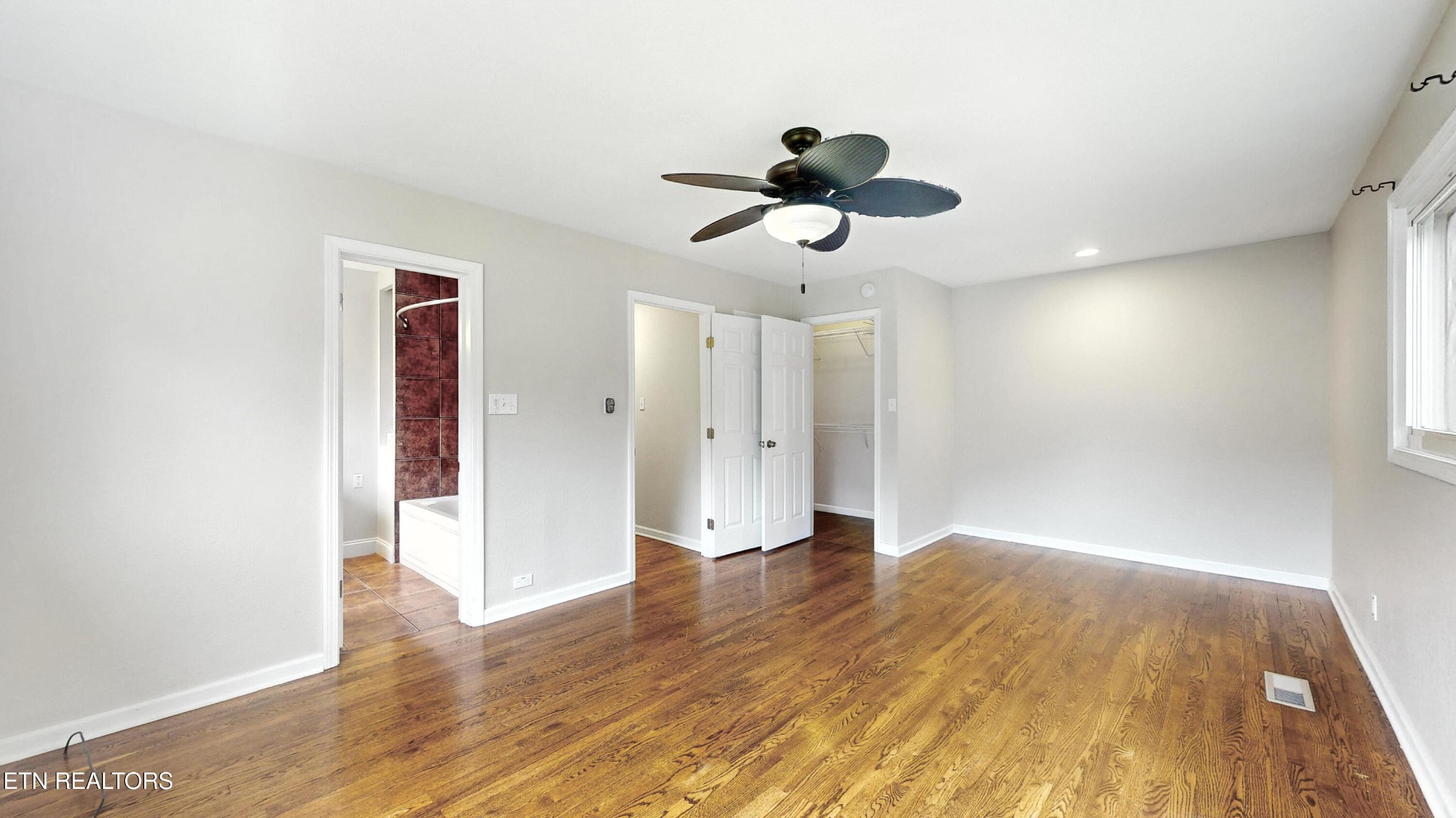 110 Ogden Circle Oak Ridge, TN 37830 - Photo 12 of 50 a view of an empty room and wooden floor