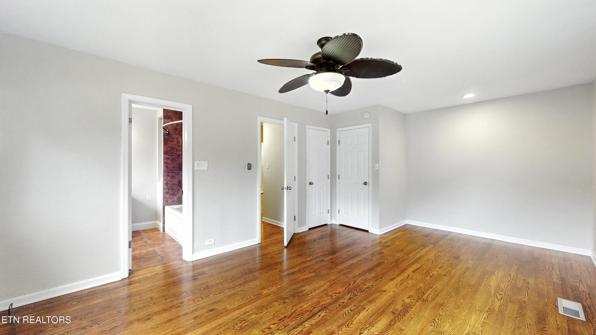 110 Ogden Circle Oak Ridge, TN 37830 - Photo 13 of 50 a view of empty room with wooden floor