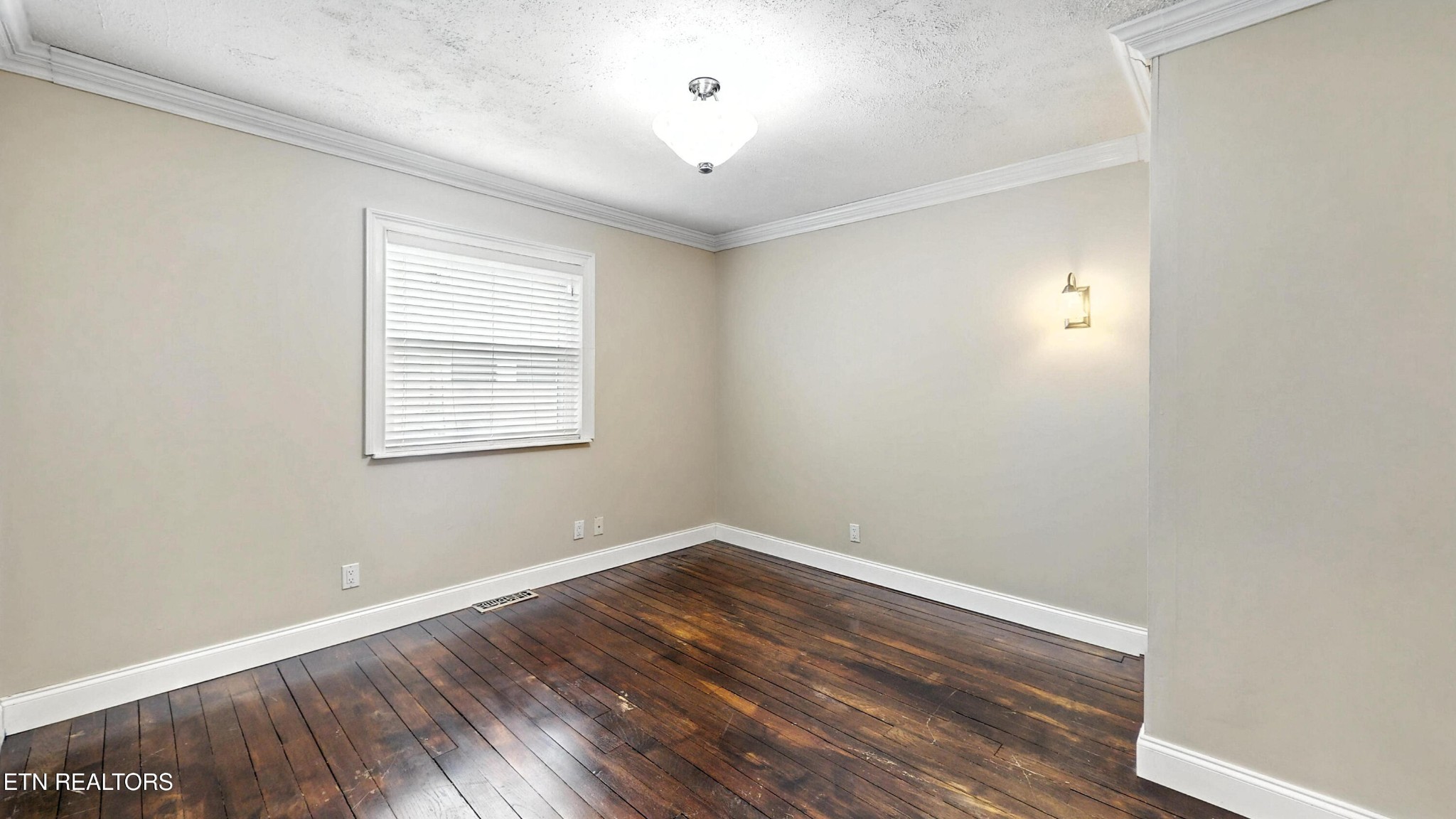 110 Ogden Circle Oak Ridge, TN 37830 - Photo 17 of 50 an empty room with wooden floor and windows