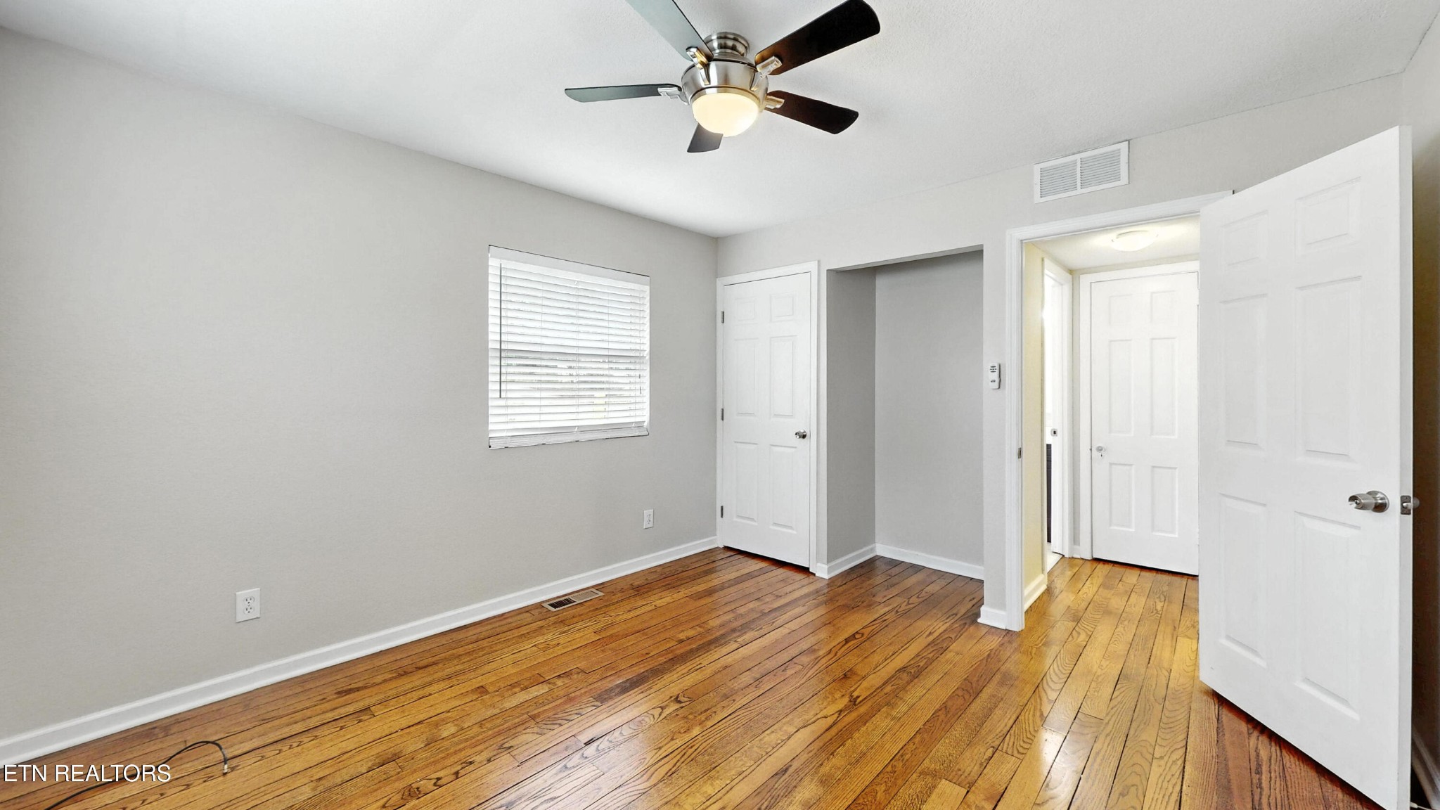 110 Ogden Circle Oak Ridge, TN 37830 - Photo 22 of 50 a view of empty room with wooden floor