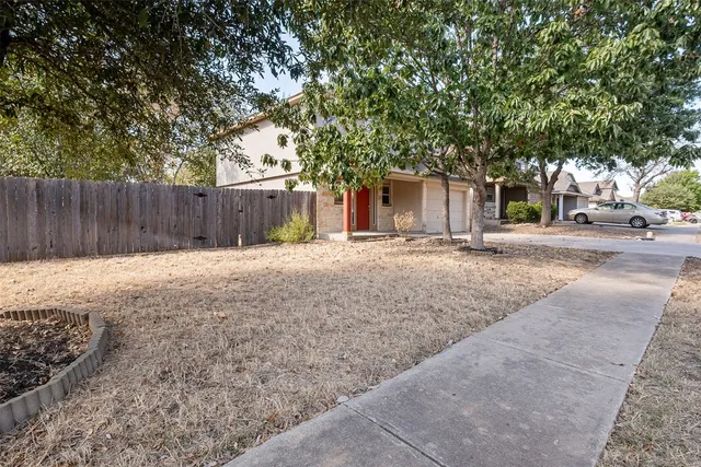 a front view of a house having yard