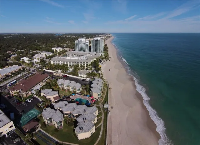 a view of beach and kitchen
