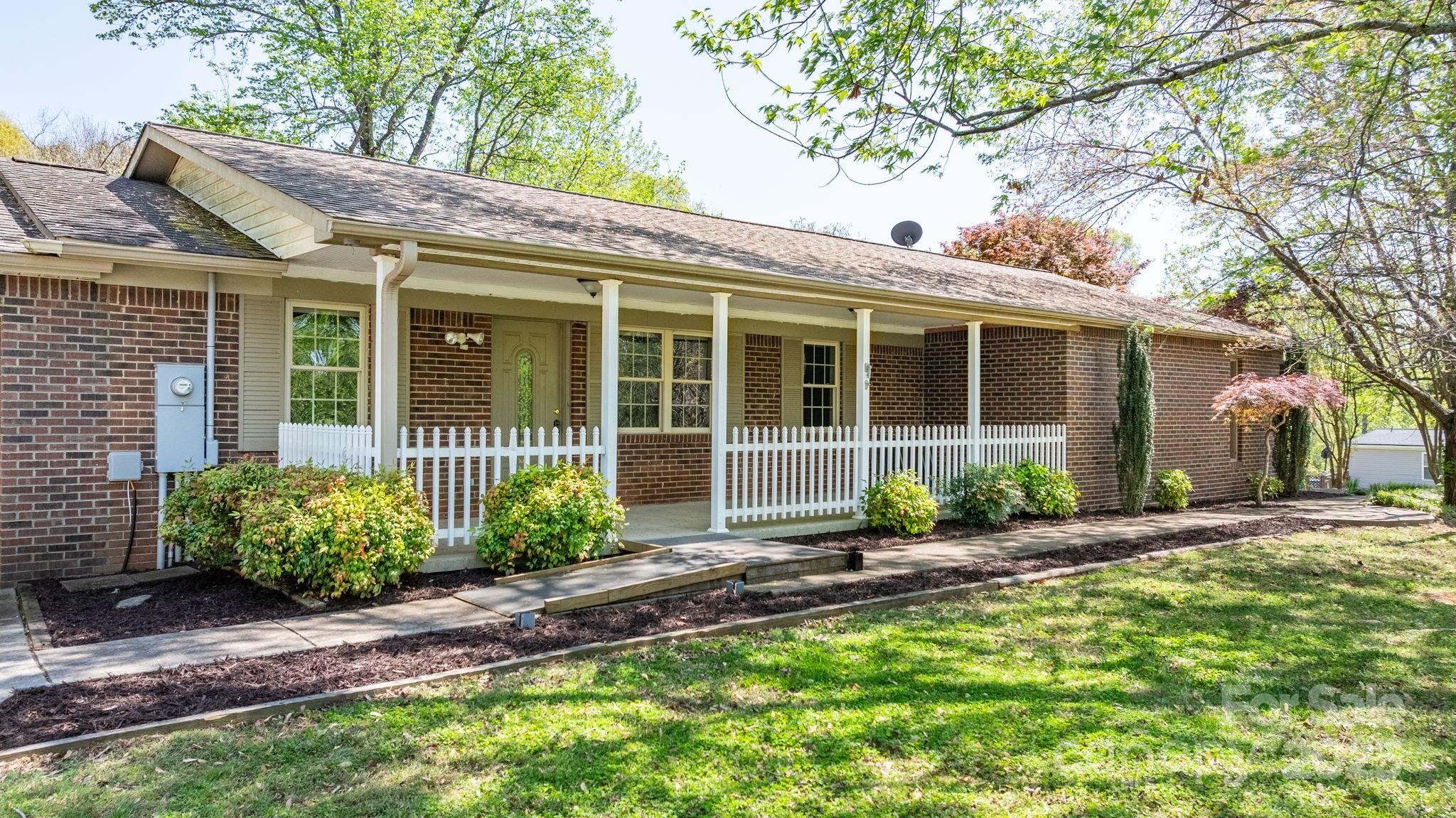 4067 Old Buff Road Hickory, NC 28602 - Photo 12 of 45 a front view of a house with garden
