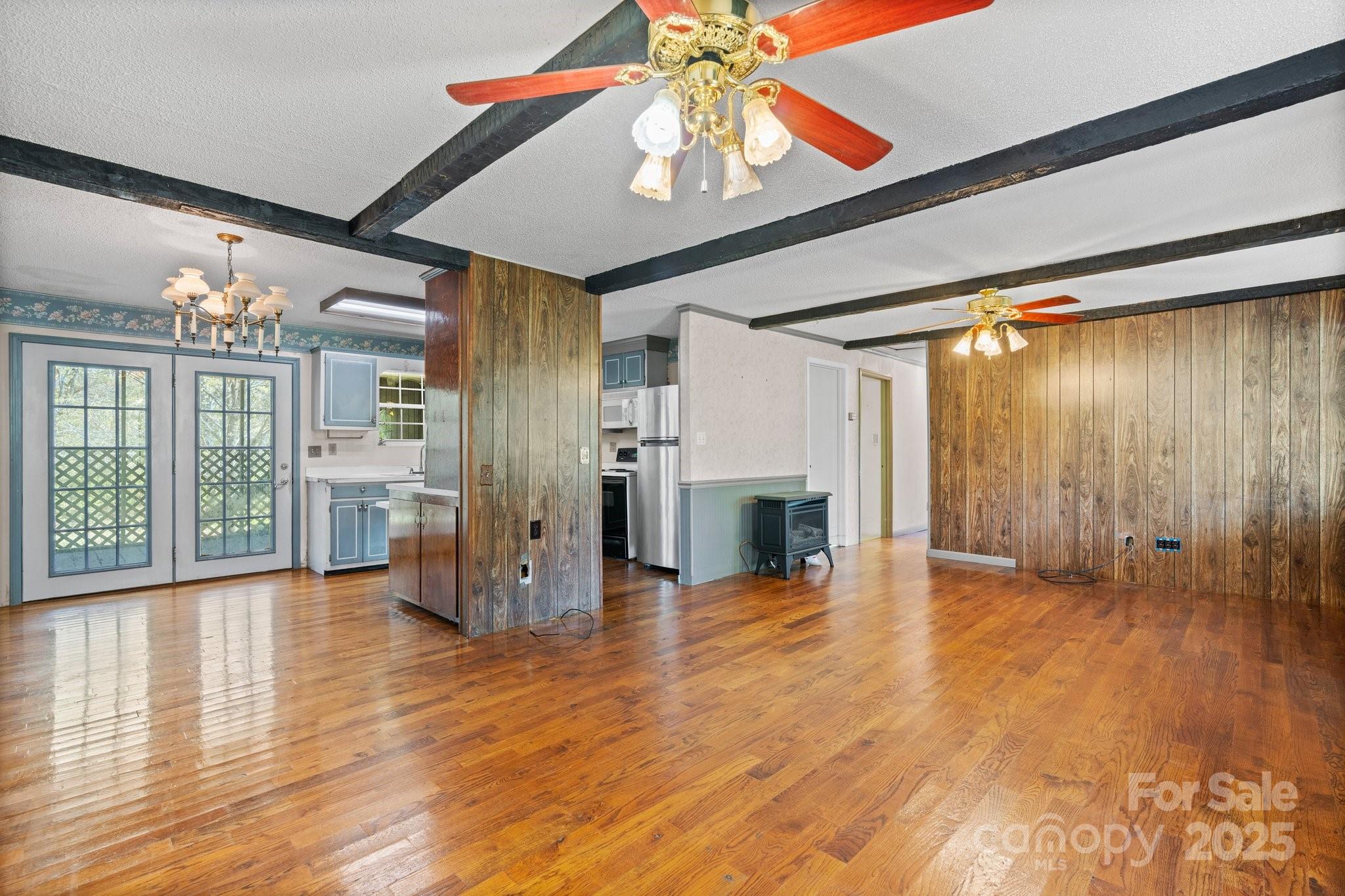 4067 Old Buff Road Hickory, NC 28602 - Photo 15 of 45 a view of an empty room with wooden floor and a window