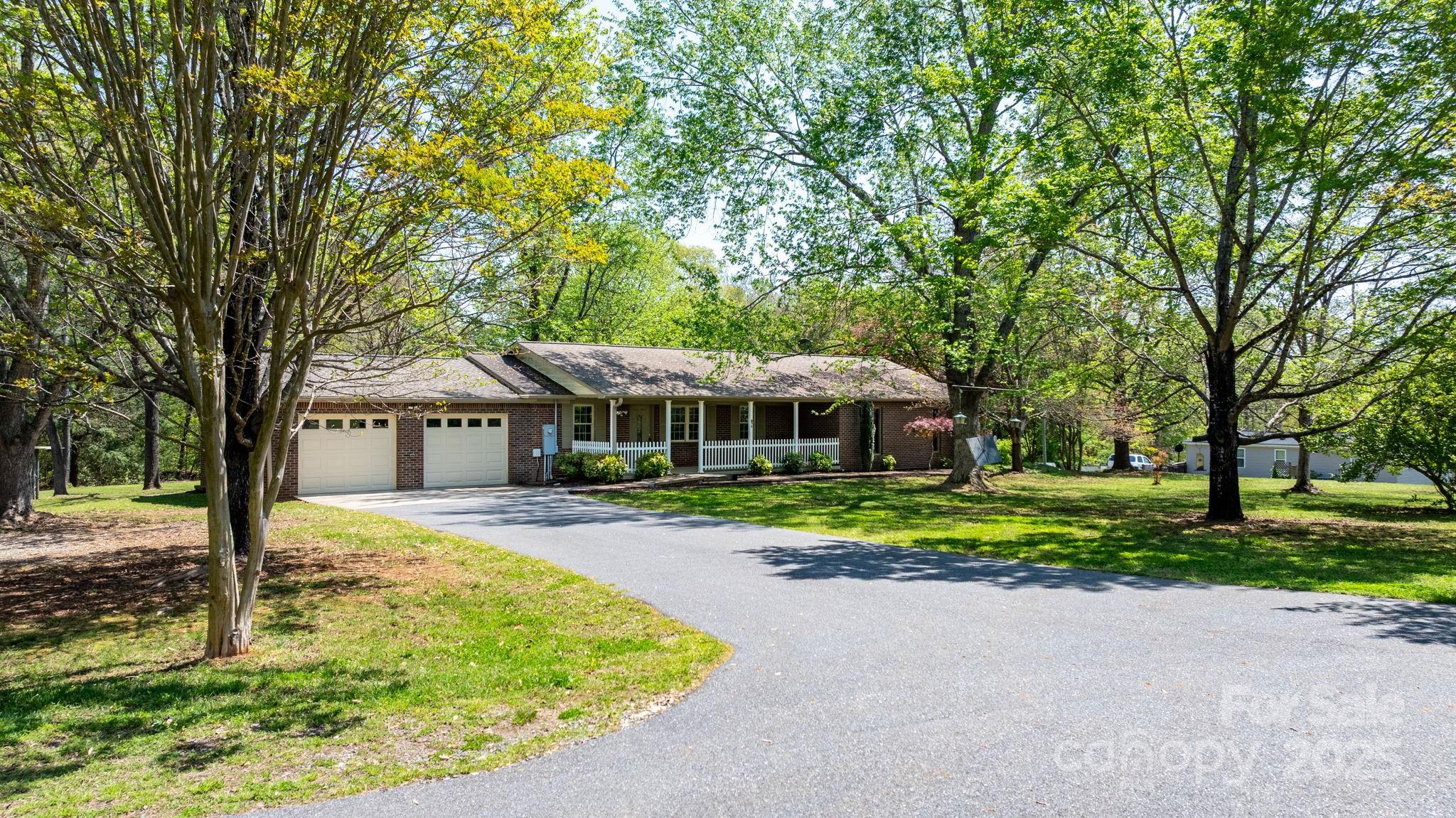 4067 Old Buff Road Hickory, NC 28602 - Photo 4 of 45 a front view of a house with garden