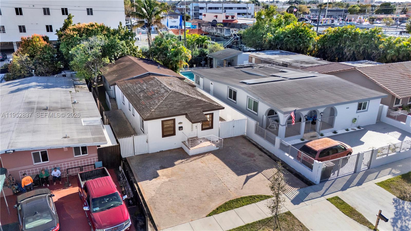 474 East 10th Street Hialeah, FL 33010 - Photo 2 of 38 an aerial view of a house with swimming pool