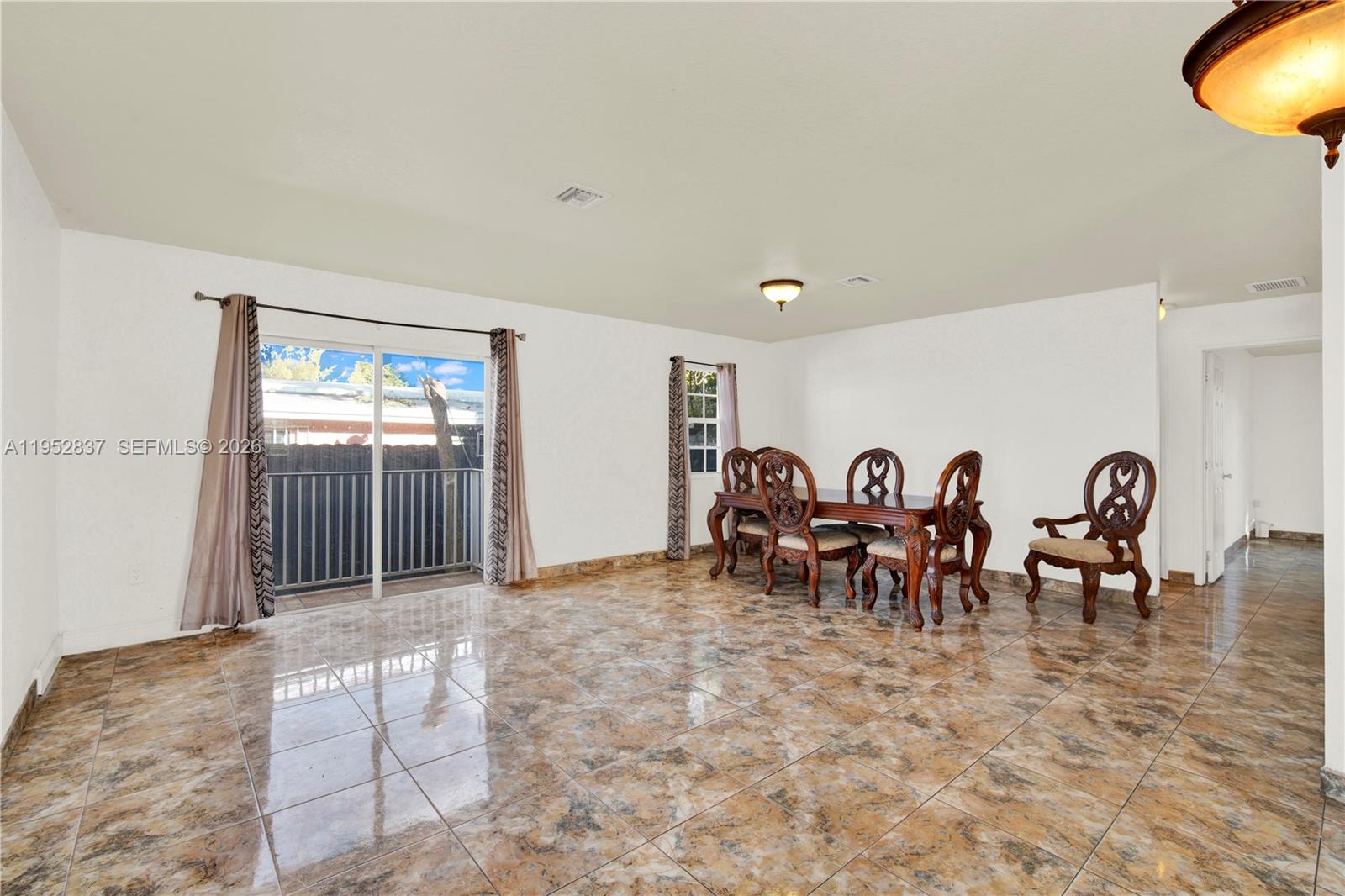 474 East 10th Street Hialeah, FL 33010 - Photo 21 of 38 a view of a livingroom with furniture and livingroom view
