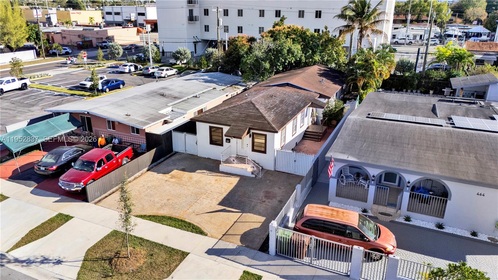474 East 10th Street Hialeah, FL 33010 - Photo 3 of 38 an aerial view of residential houses and outdoor space