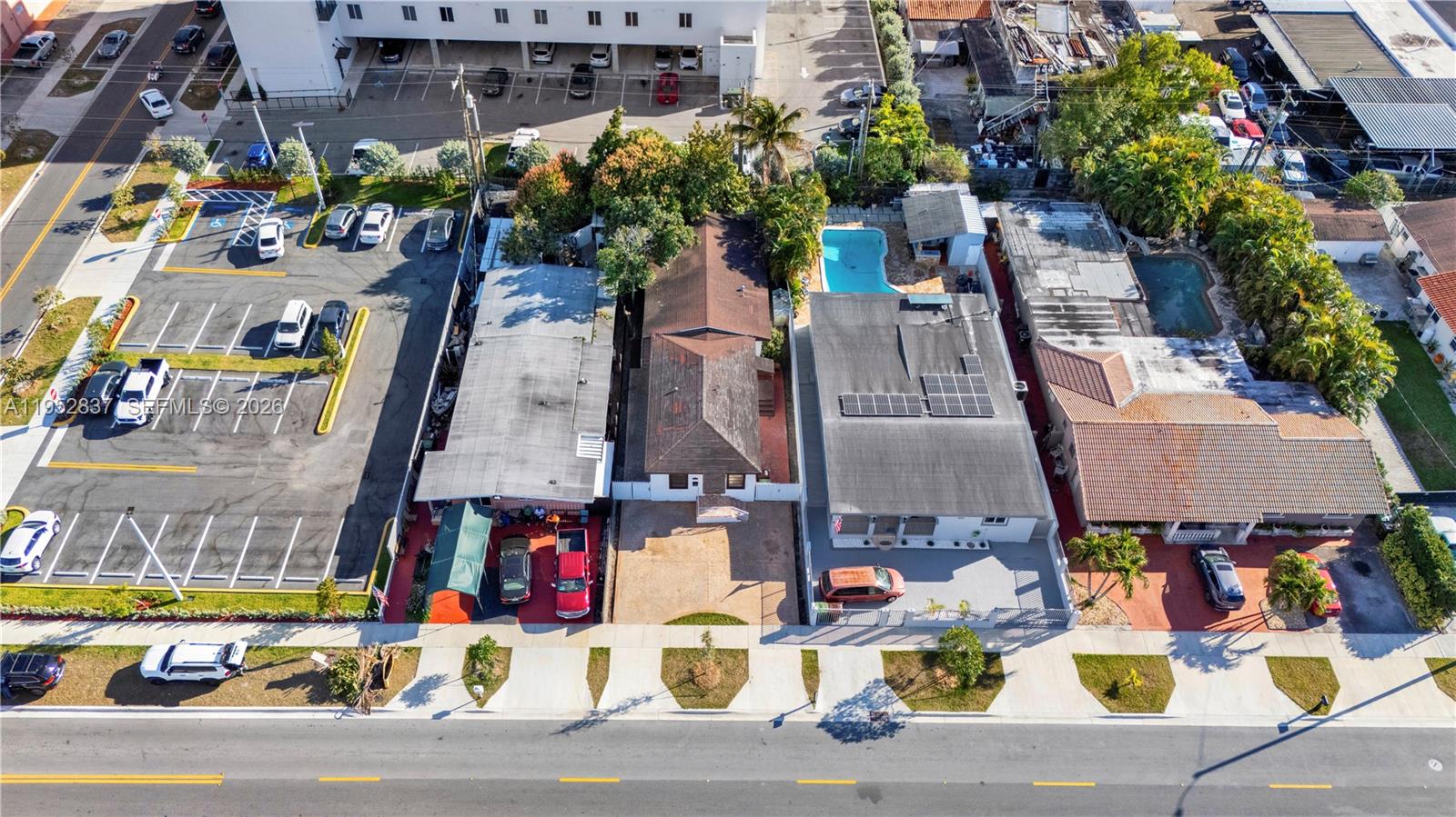 474 East 10th Street Hialeah, FL 33010 - Photo 36 of 38 an aerial view of residential houses and street