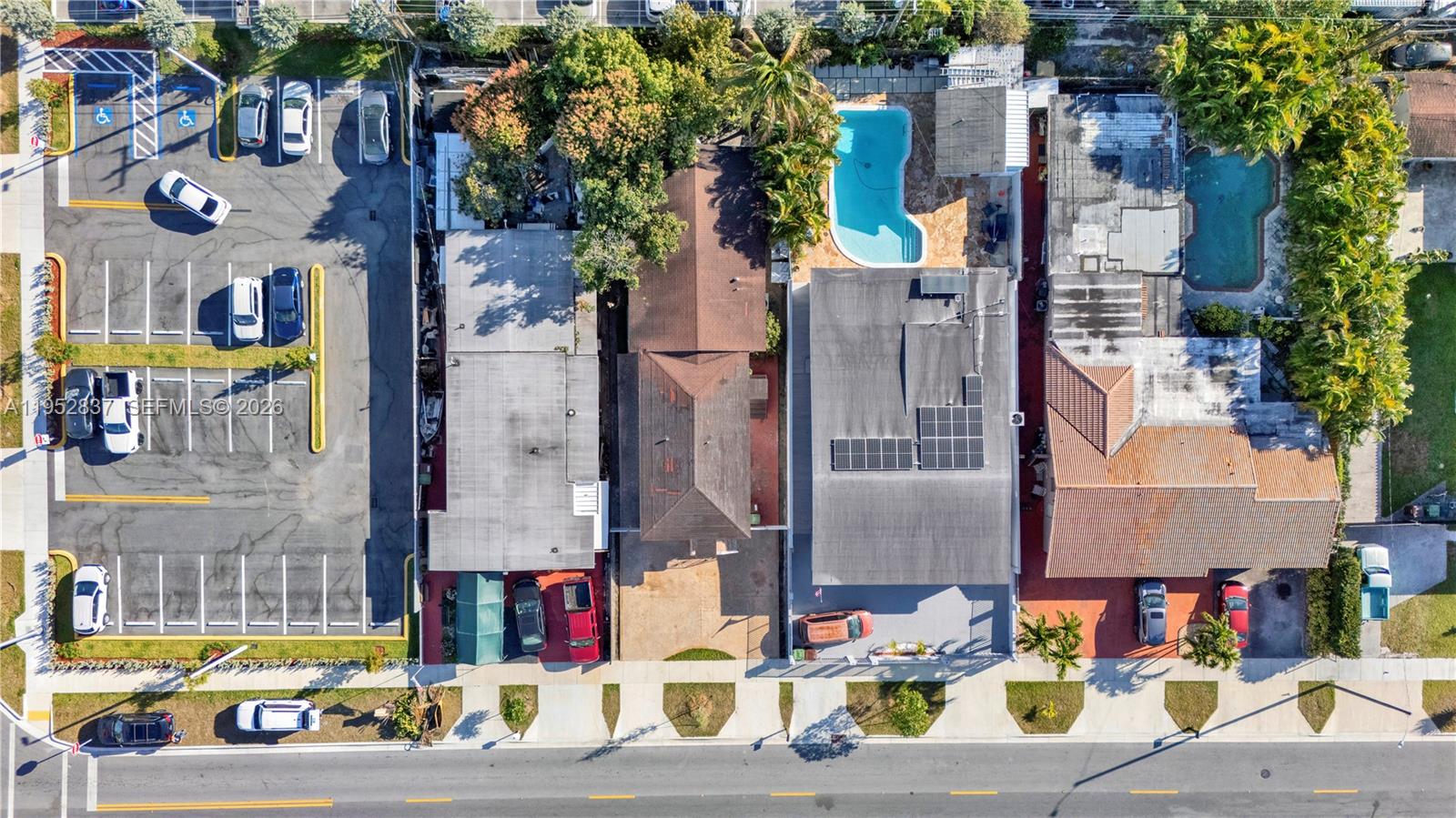 474 East 10th Street Hialeah, FL 33010 - Photo 37 of 38 a street view with tall buildings