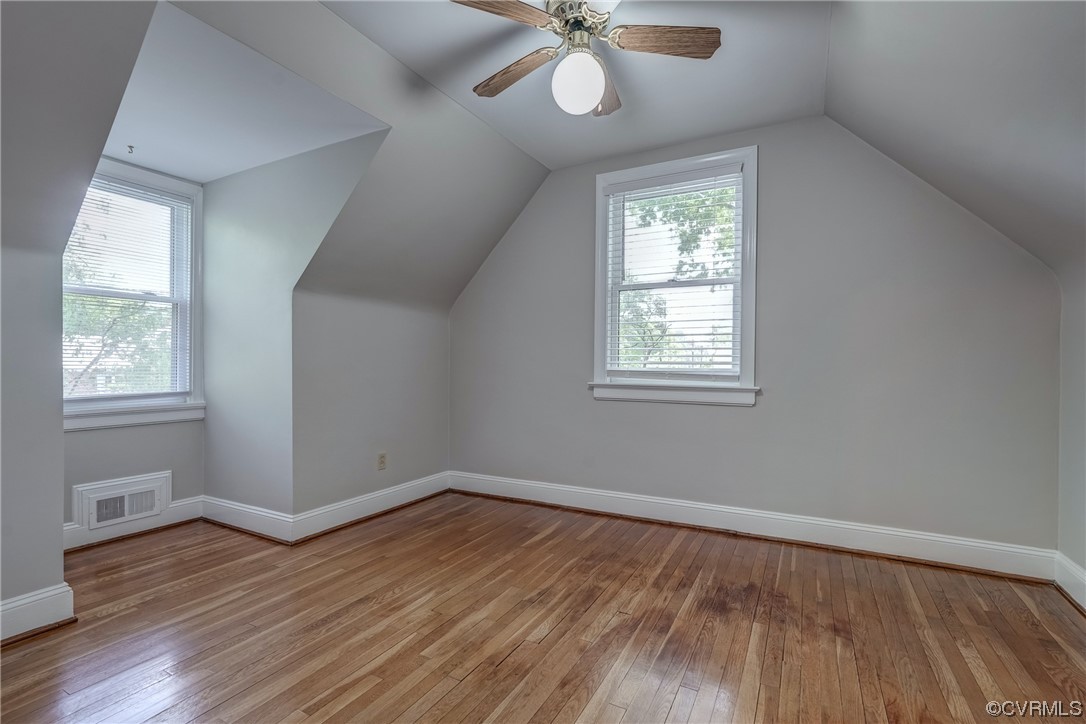 1802 Bremo Road Richmond, VA 23226 - Photo 29 of 50 a view of an empty room with wooden floor and a window