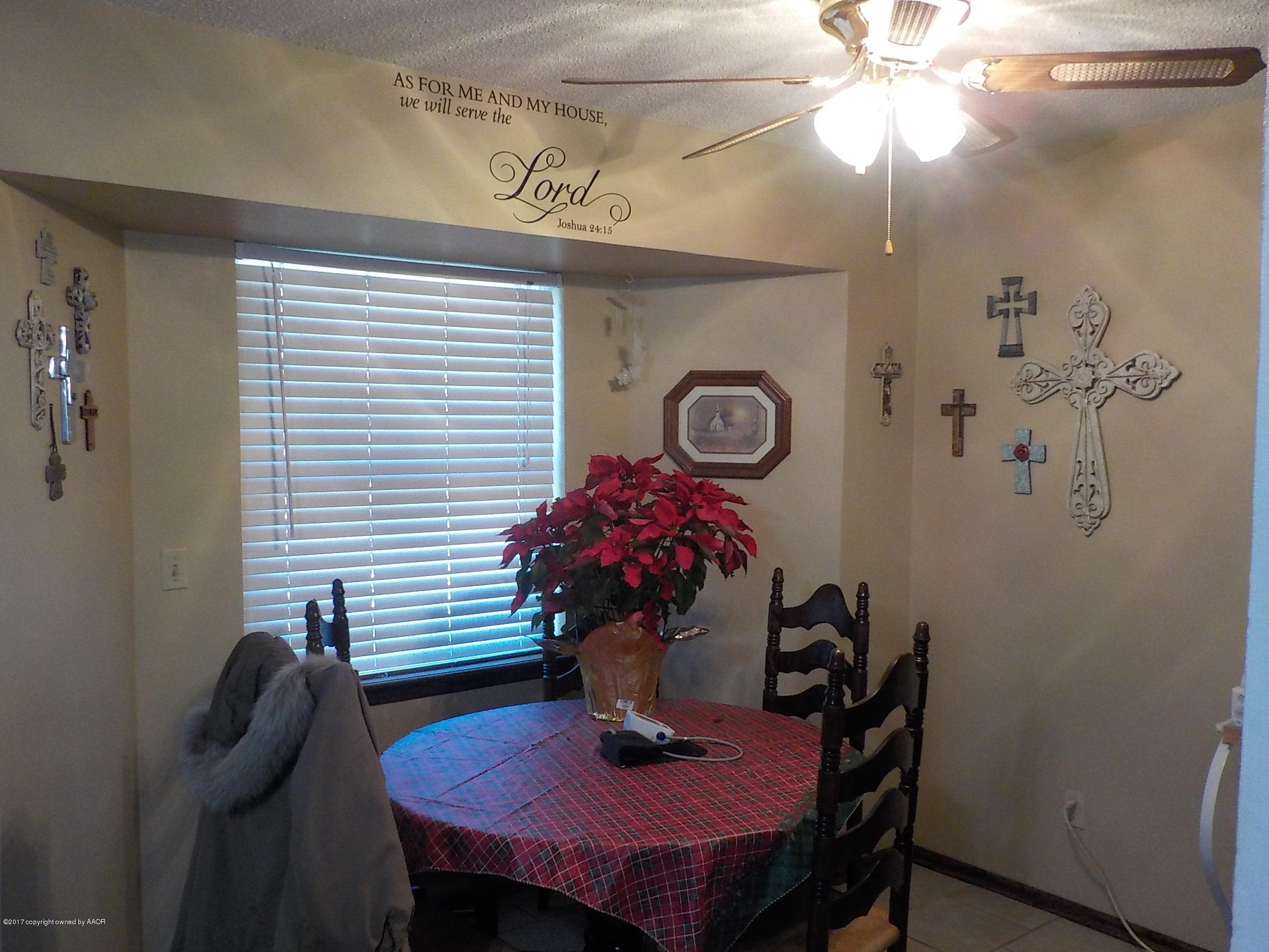 5102 Shield Drive Amarillo, TX 79110 - Photo 4 of 21 a dining room with furniture and wooden floor
