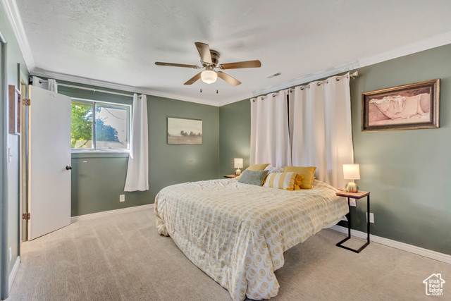 360 East Center Street Centerville, UT 84014 - Photo 15 of 41 Bedroom featuring crown molding, light carpet, and a ceiling fan
