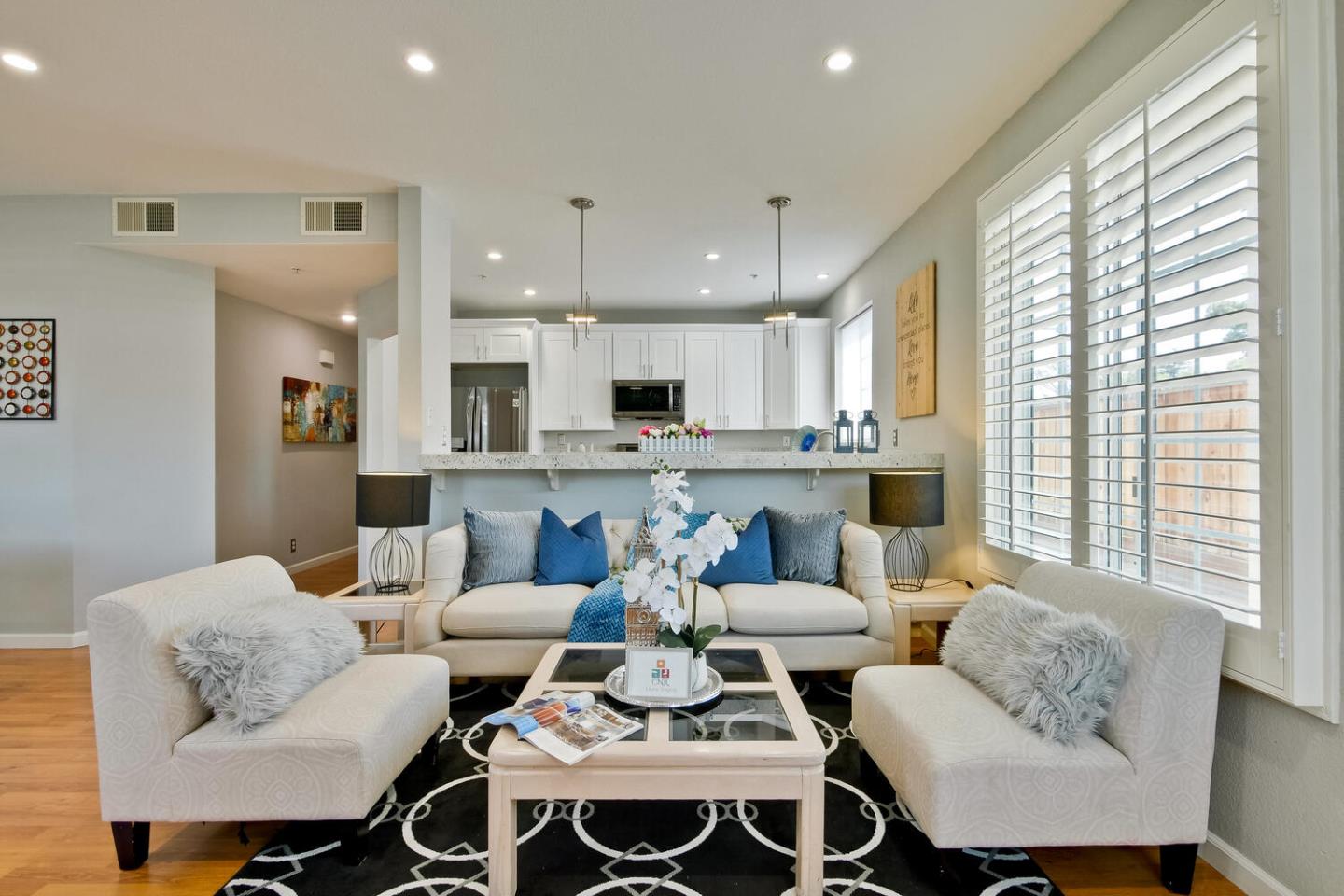 935 Old County Road, Unit 44 Belmont, CA 94002 - Photo 11 of 57 a living room with furniture kitchen and a large window