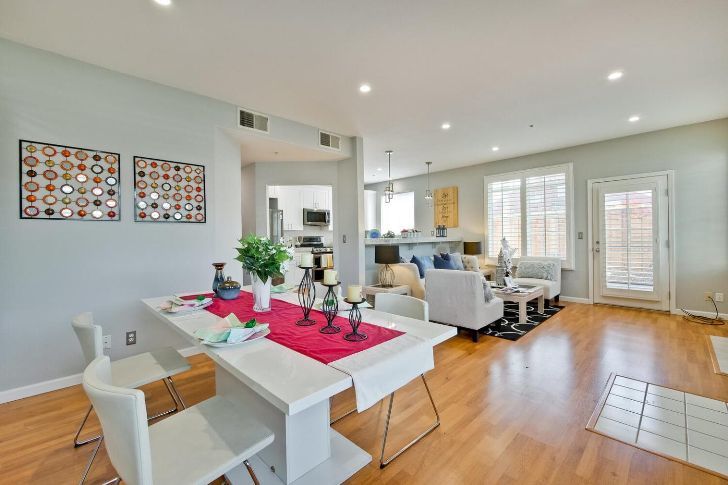 935 Old County Road, Unit 44 Belmont, CA 94002 - Photo 15 of 57 a living room with furniture and wooden floor