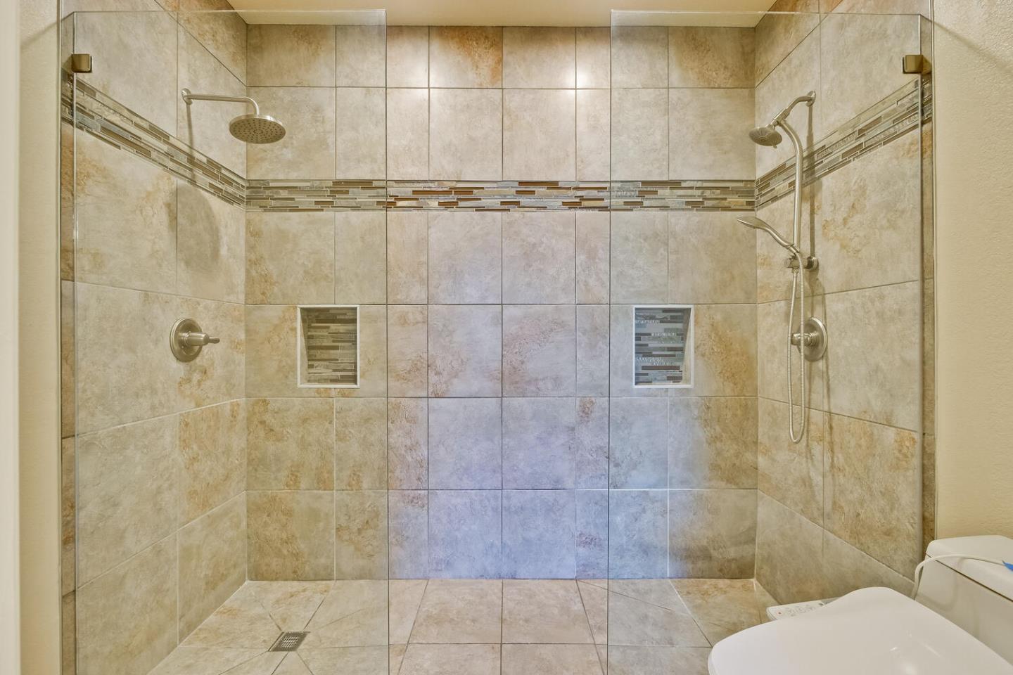 935 Old County Road, Unit 44 Belmont, CA 94002 - Photo 34 of 57 a bathroom with a toilet and shower