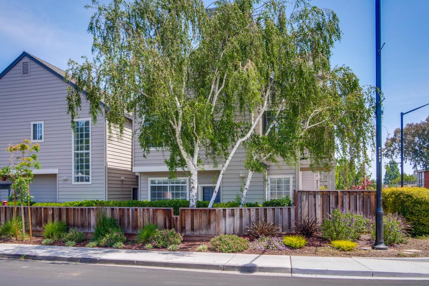 935 Old County Road, Unit 44 Belmont, CA 94002 - Photo 4 of 57 a view of a house with a street