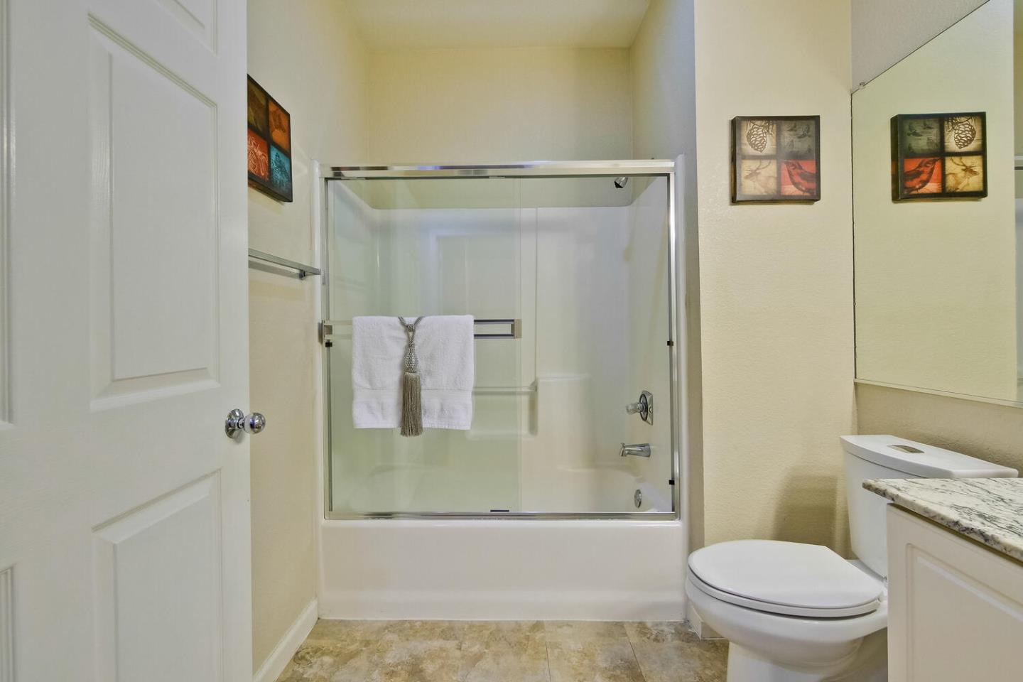 935 Old County Road, Unit 44 Belmont, CA 94002 - Photo 45 of 57 a bathroom with a shower and a toilet