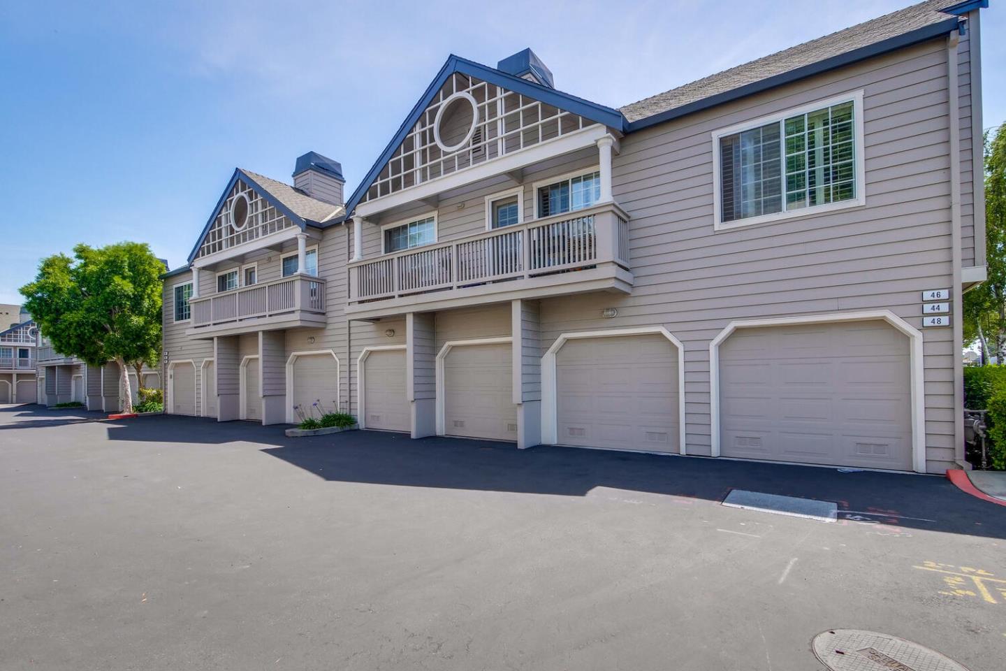 935 Old County Road, Unit 44 Belmont, CA 94002 - Photo 47 of 57 a front view of a house with yard