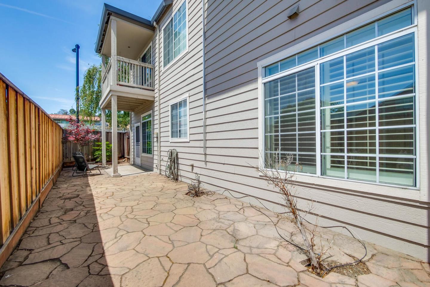 935 Old County Road, Unit 44 Belmont, CA 94002 - Photo 50 of 57 a house view with a backyard space