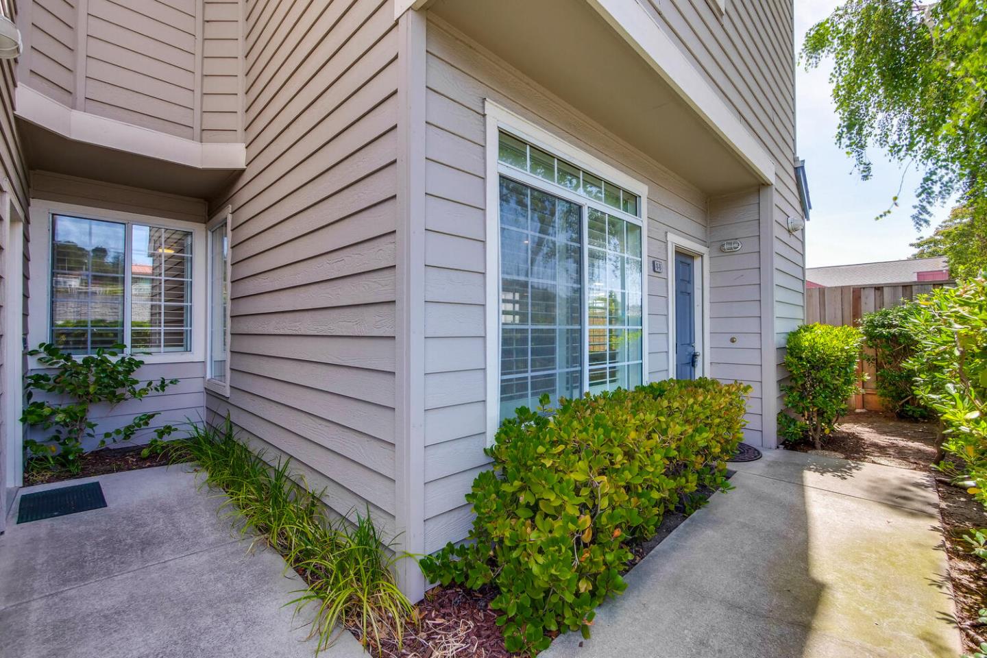 935 Old County Road, Unit 44 Belmont, CA 94002 - Photo 5 of 57 a view of a pathway besides a house