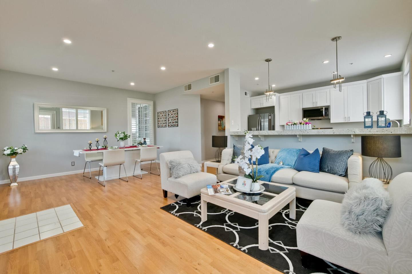 935 Old County Road, Unit 44 Belmont, CA 94002 - Photo 8 of 57 a living room with furniture and a wooden floor