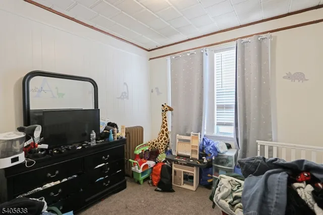 a room with furniture and a window