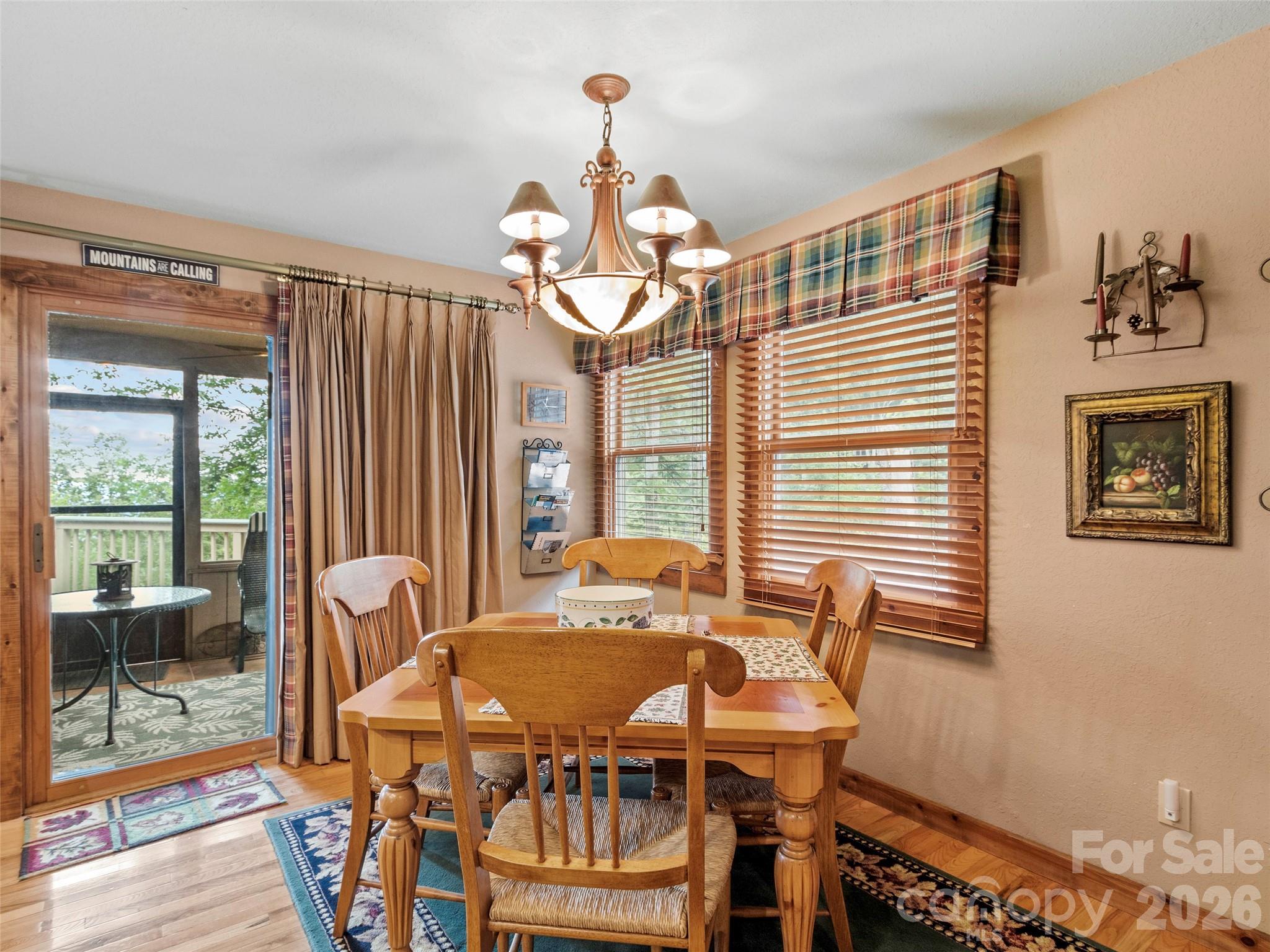 21 Ivy Ridge Road Burnsville, NC 28714 - Photo 13 of 35 a view of a dining room with furniture window and outside view