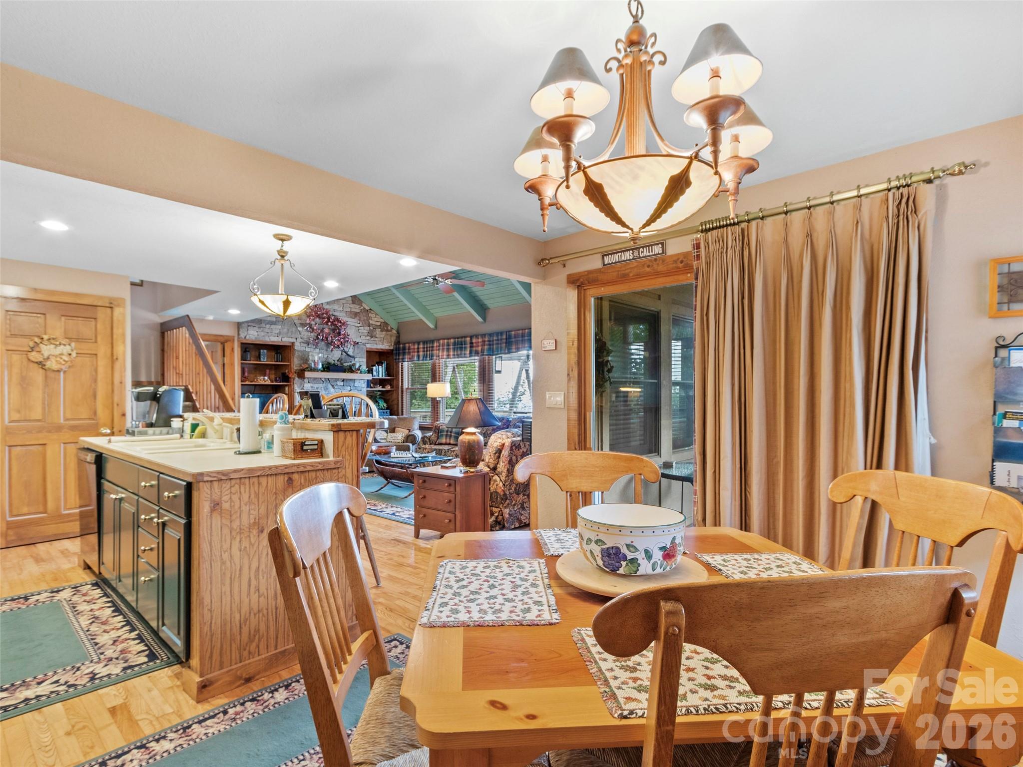 21 Ivy Ridge Road Burnsville, NC 28714 - Photo 14 of 35 a view of a dining room with furniture window and outside view