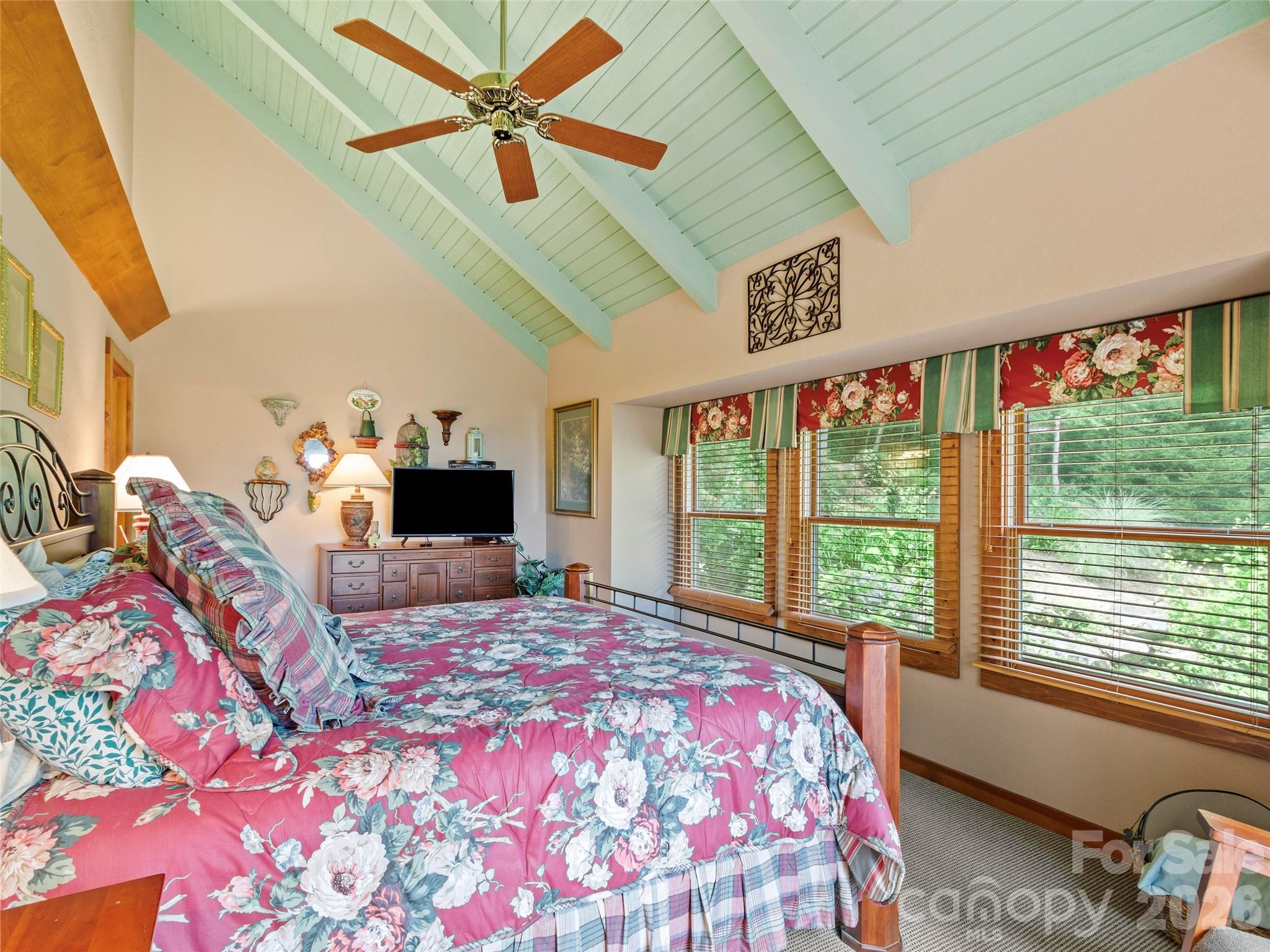 21 Ivy Ridge Road Burnsville, NC 28714 - Photo 22 of 35 a bedroom with a bed dresser and a large window