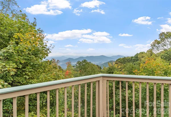 a view of a balcony with an outdoor space