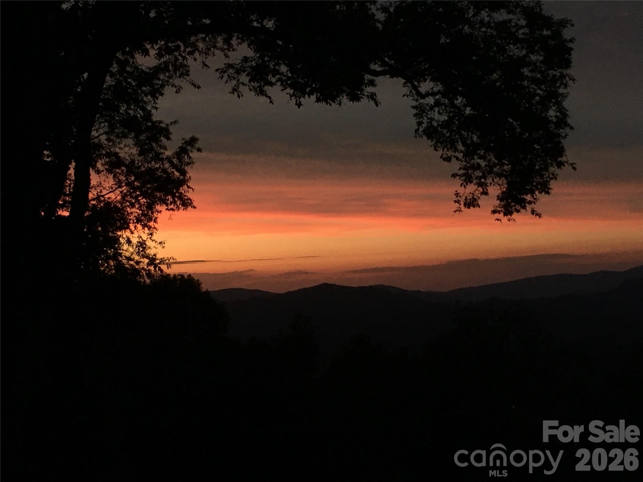 21 Ivy Ridge Road Burnsville, NC 28714 - Photo 35 of 35 a view of sunset and a yard